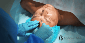 cosmetic surgeon with male patient