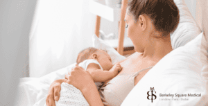 mother breast feeding after reduction surgery