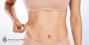 woman showing results after vaser lipo