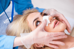 rhinoplasty patient listening to her doctor