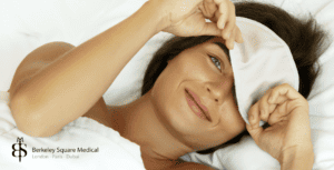 female patient in bed after surgery
